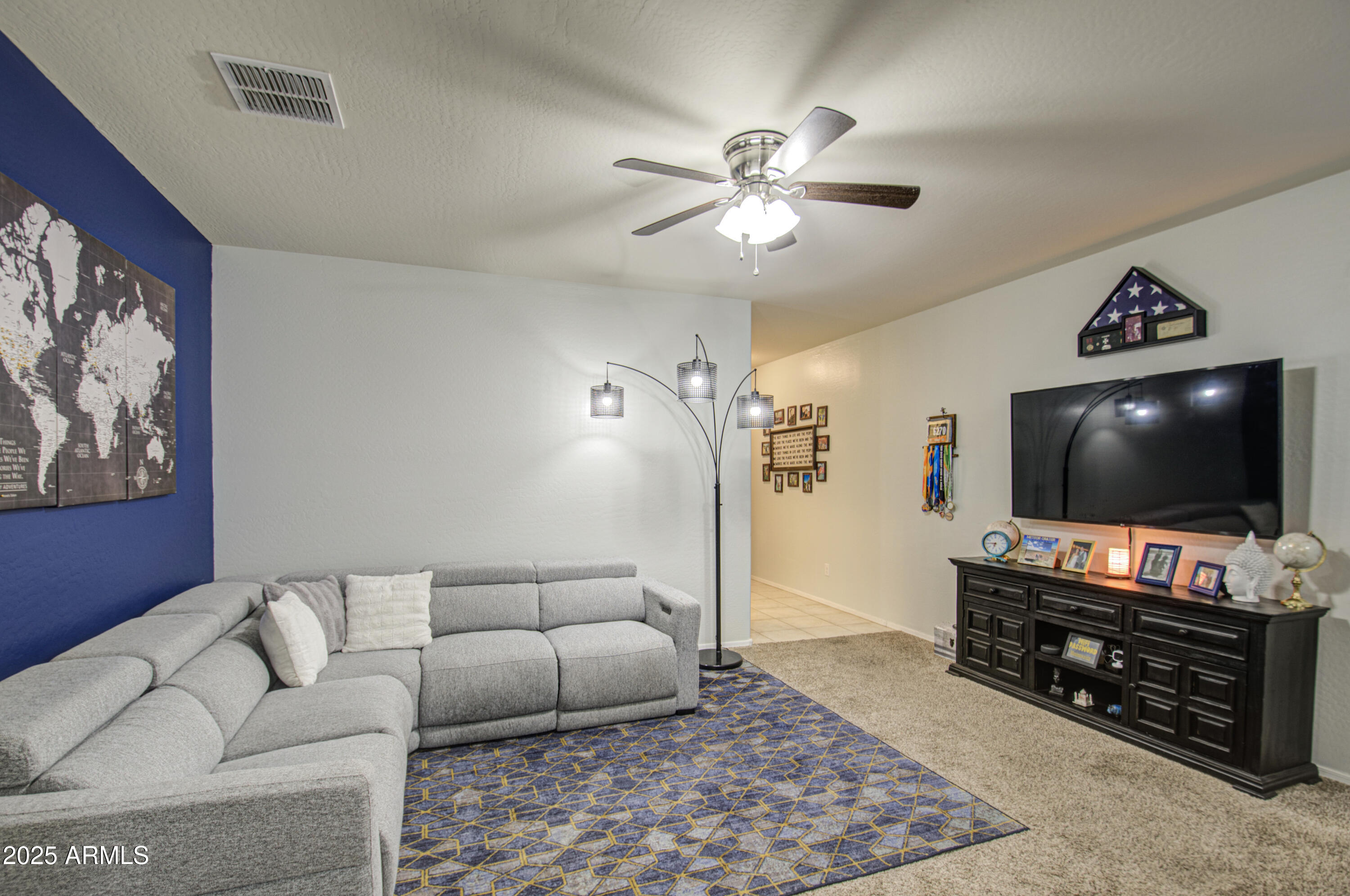 30945 West Picadilly Road Buckeye, AZ 85396 - Photo 9 of 39 Living Room 1