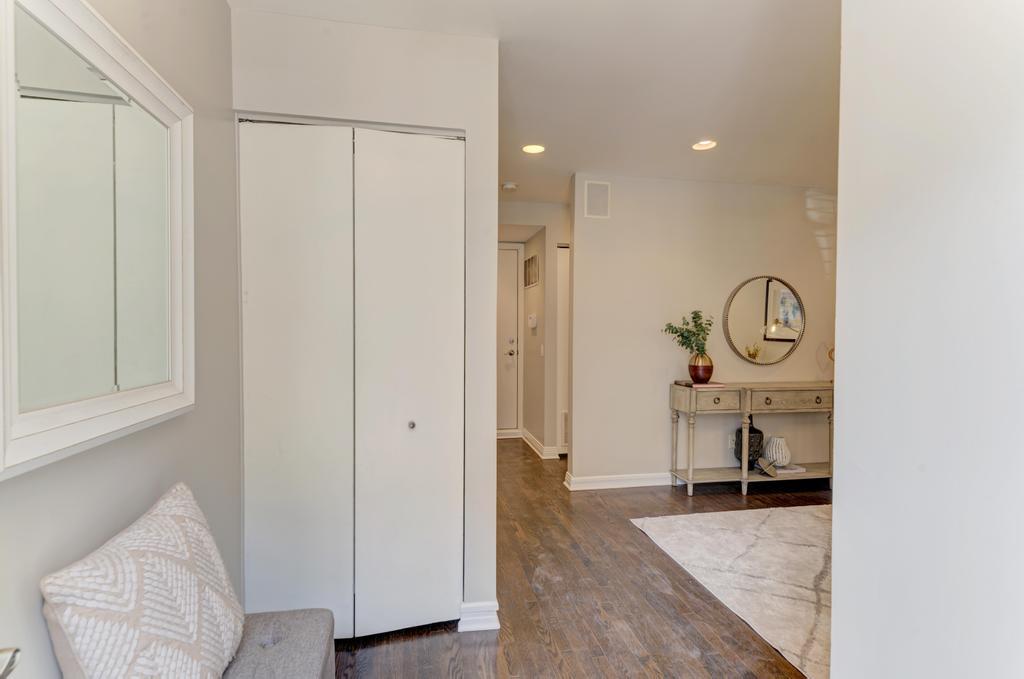512 North Peoria Street Chicago, IL 60642 - Photo 2 of 32 a view of a livingroom with furniture and wooden floor