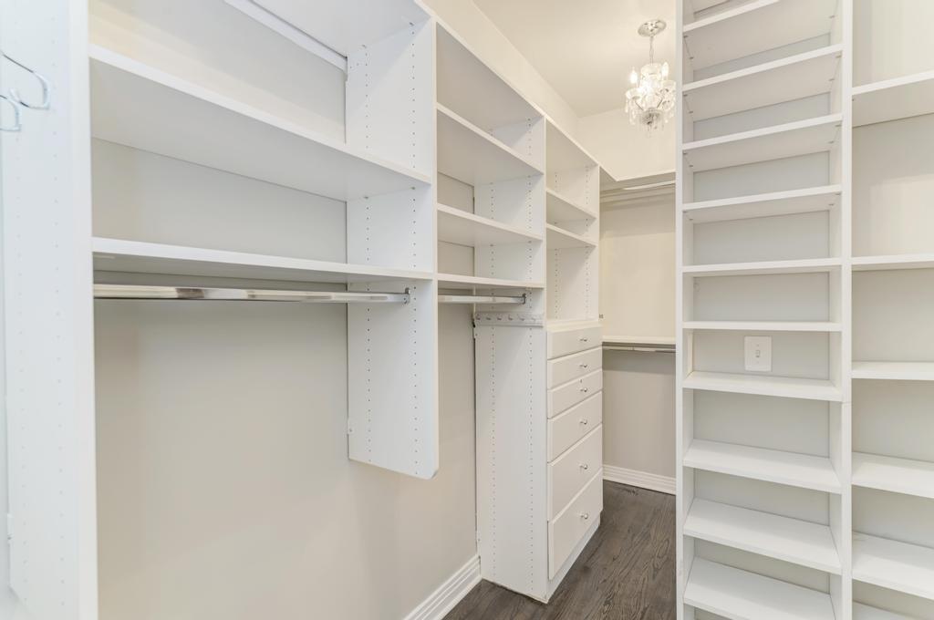 512 North Peoria Street Chicago, IL 60642 - Photo 22 of 32 a view of walk in closet with empty racks