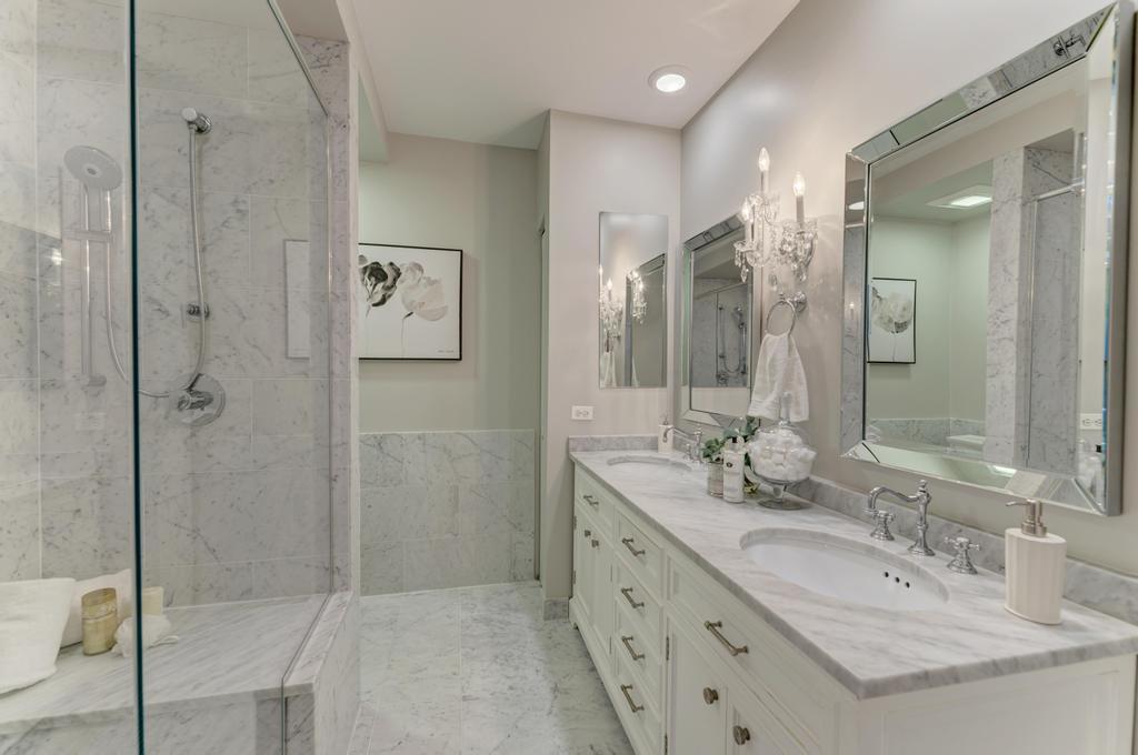 512 North Peoria Street Chicago, IL 60642 - Photo 23 of 32 a bathroom with a double vanity sink mirror and double
