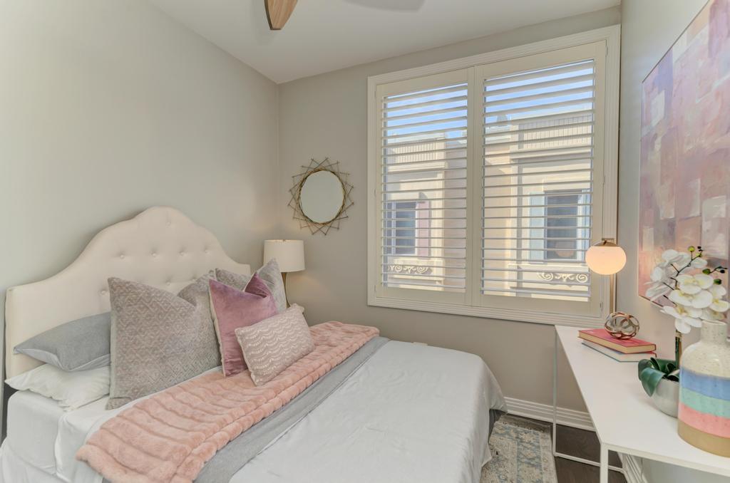 512 North Peoria Street Chicago, IL 60642 - Photo 25 of 32 a bedroom with a bed and window