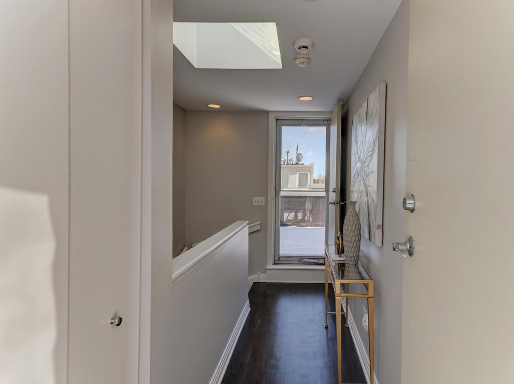 512 North Peoria Street Chicago, IL 60642 - Photo 30 of 32 a view of entryway with wooden floor
