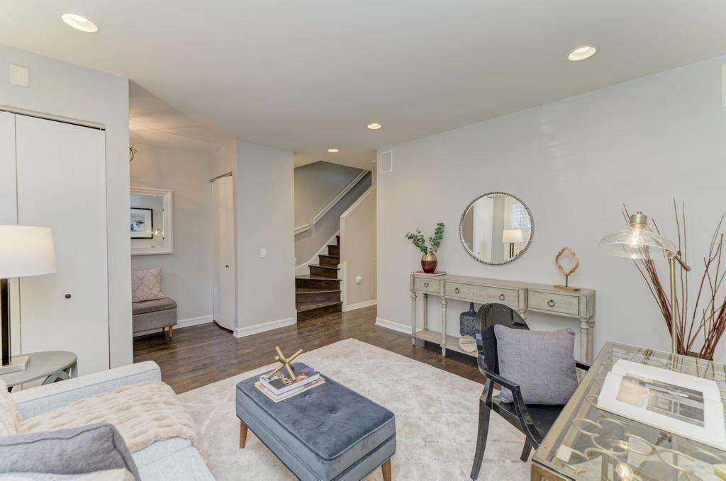 512 North Peoria Street Chicago, IL 60642 - Photo 6 of 32 a living room with furniture and a fireplace