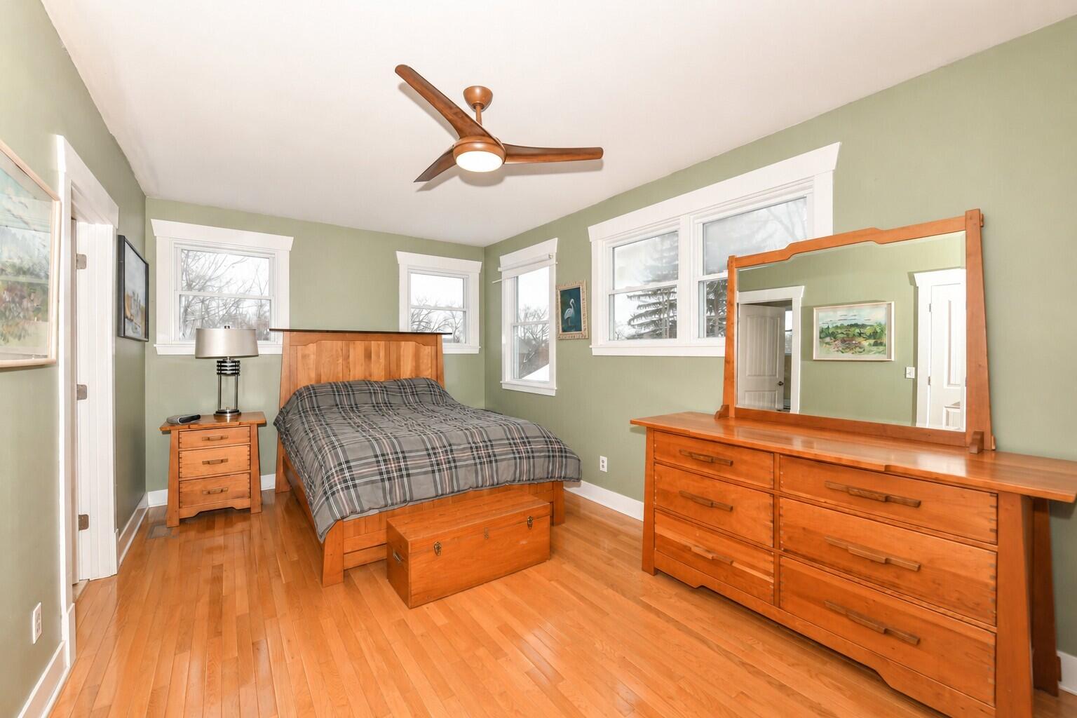 4222 Maple Drive Delavan, WI 53115 - Photo 12 of 42 Large primary bedroom boasts oversized closet and private bath with walk-in shower and whirlpool tub.