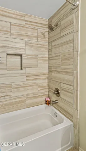 a bathroom with a bathtub