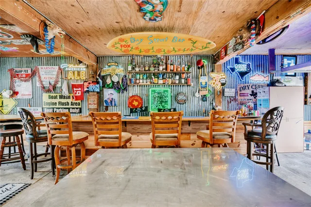 a area with lots of table and chairs