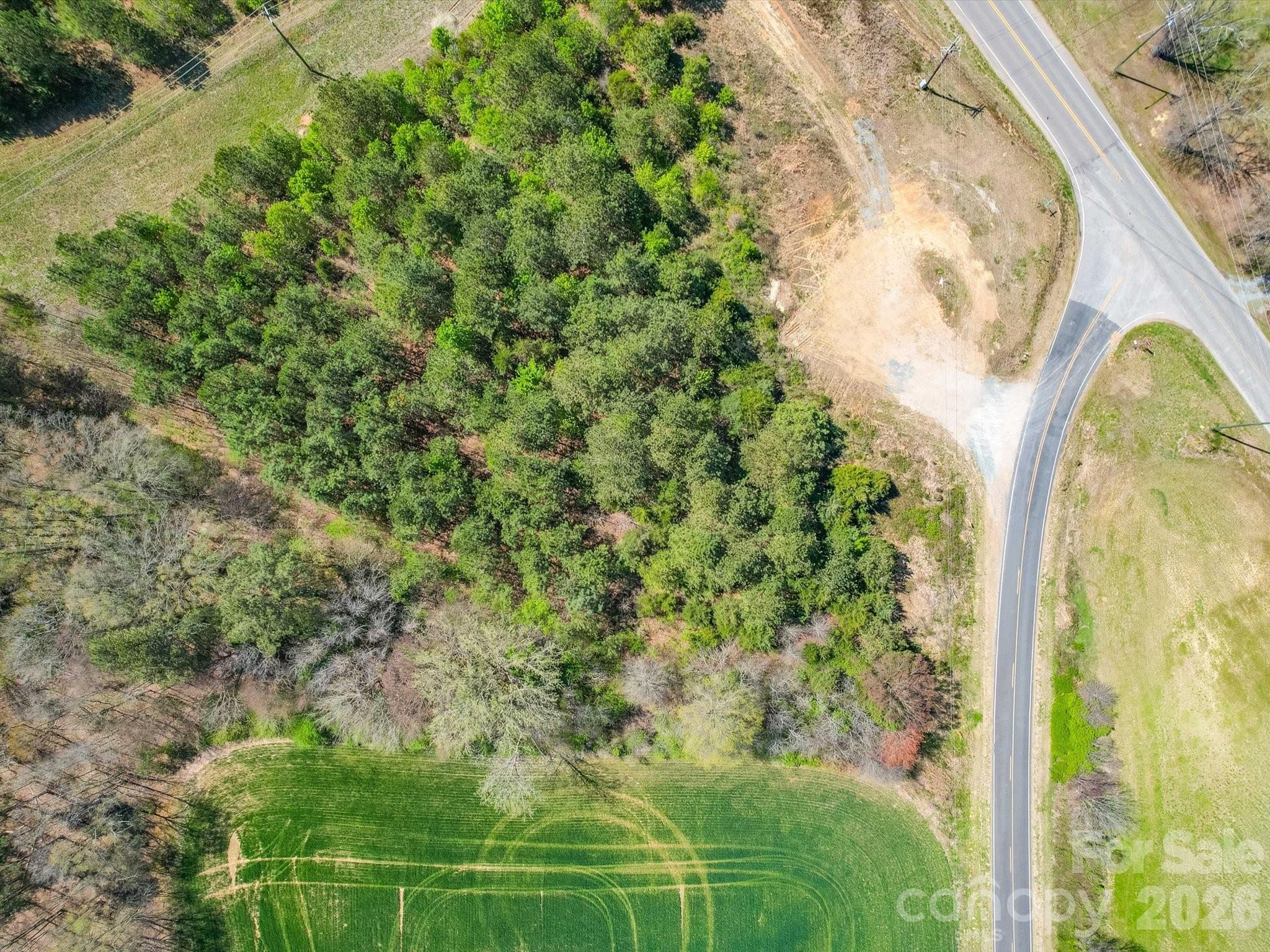 2722 Olive Branch Road Monroe, NC 28110 - Photo 3 of 7 a view of a yard with plants