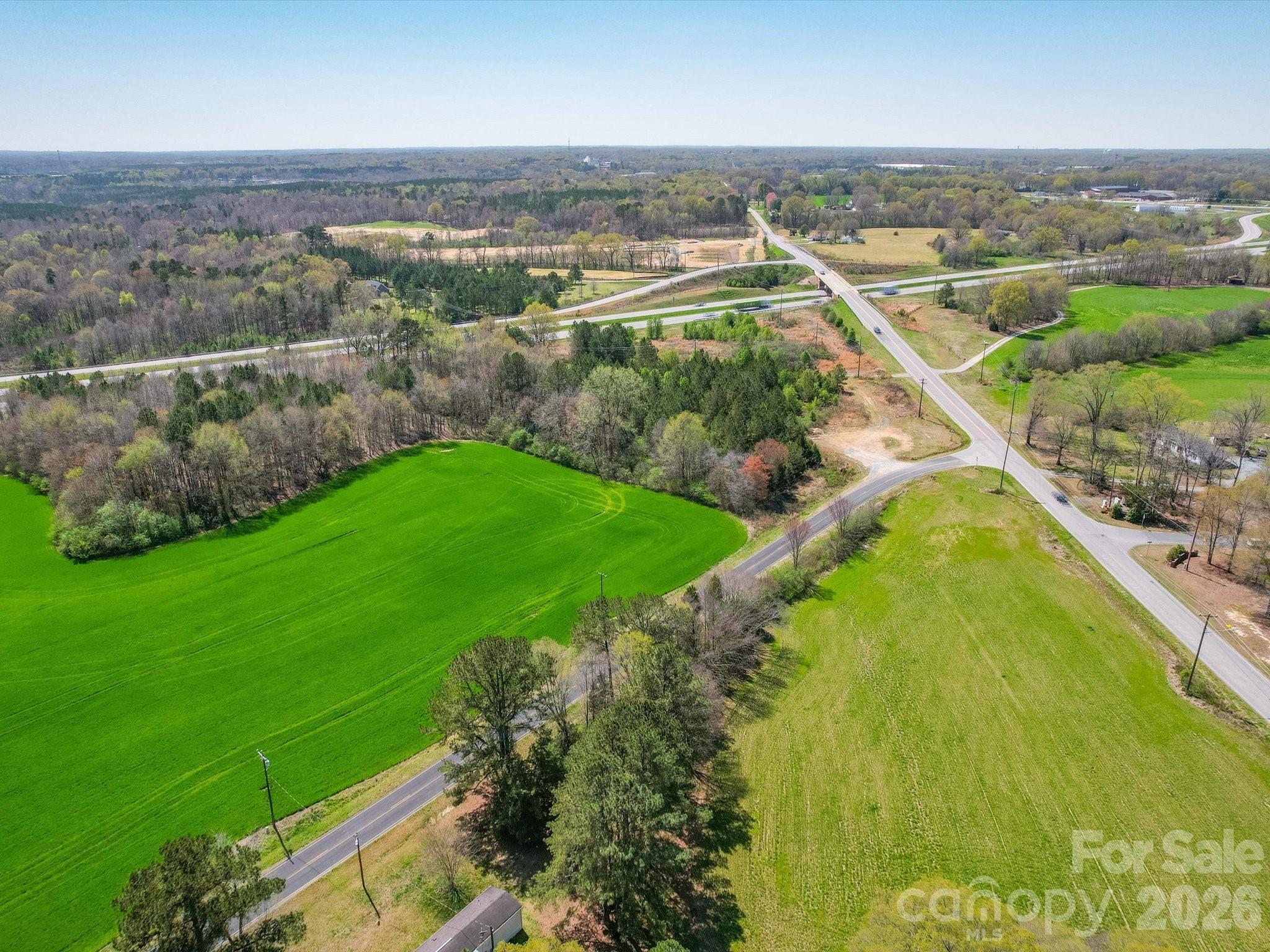2722 Olive Branch Road Monroe, NC 28110 - Photo 7 of 7 an aerial view of a residential houses with outdoor space and trees