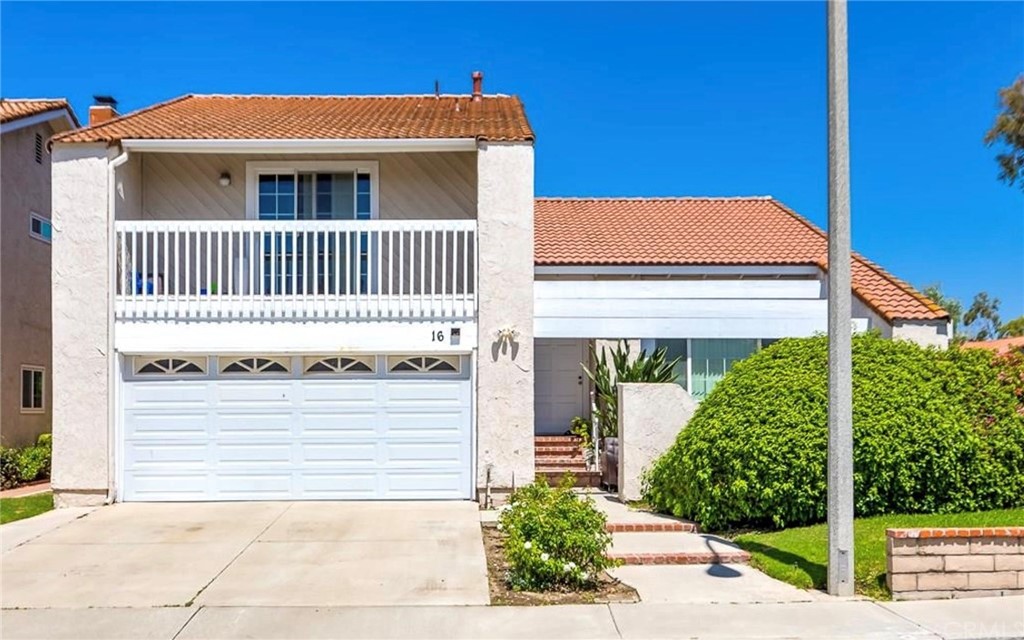 16 Duane Irvine, CA 92620 - Photo 1 of 1 a front view of a house with a yard and potted plants