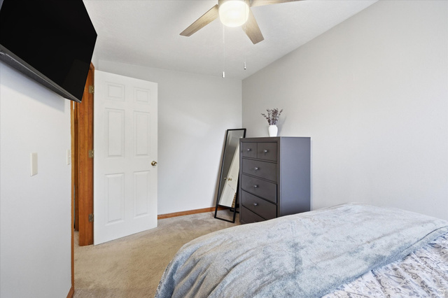 45 West 100 South Mendon, UT 84325 - Photo 39 of 64 Bedroom featuring light colored carpet and ceiling fan