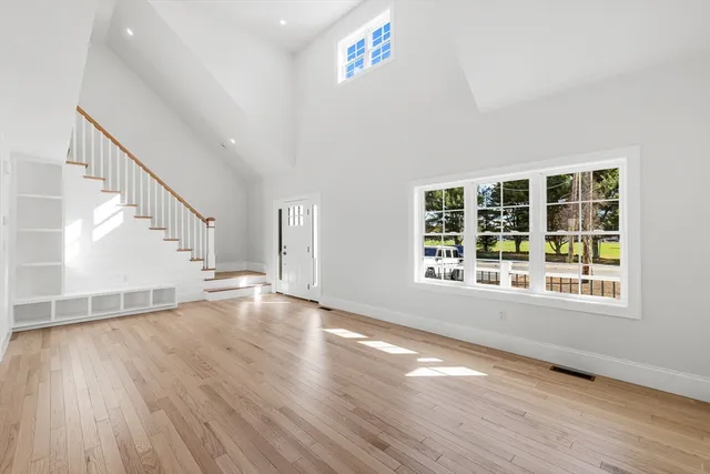 a kitchen with stainless steel appliances granite countertop a sink a stove and a granite counter tops
