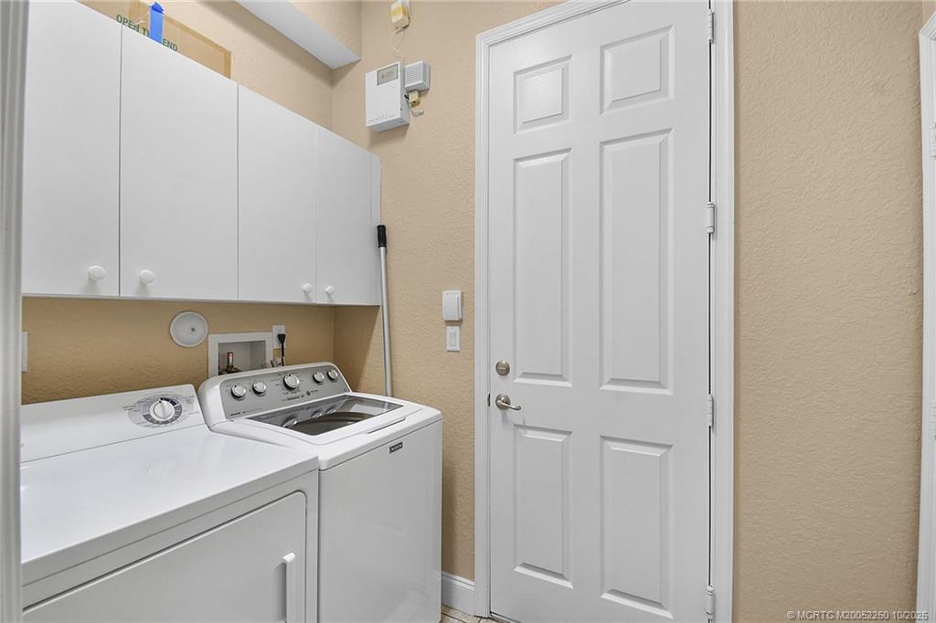 254 Southwest Walking Path Stuart, FL 34997 - Photo 15 of 31 a room with storage and utility