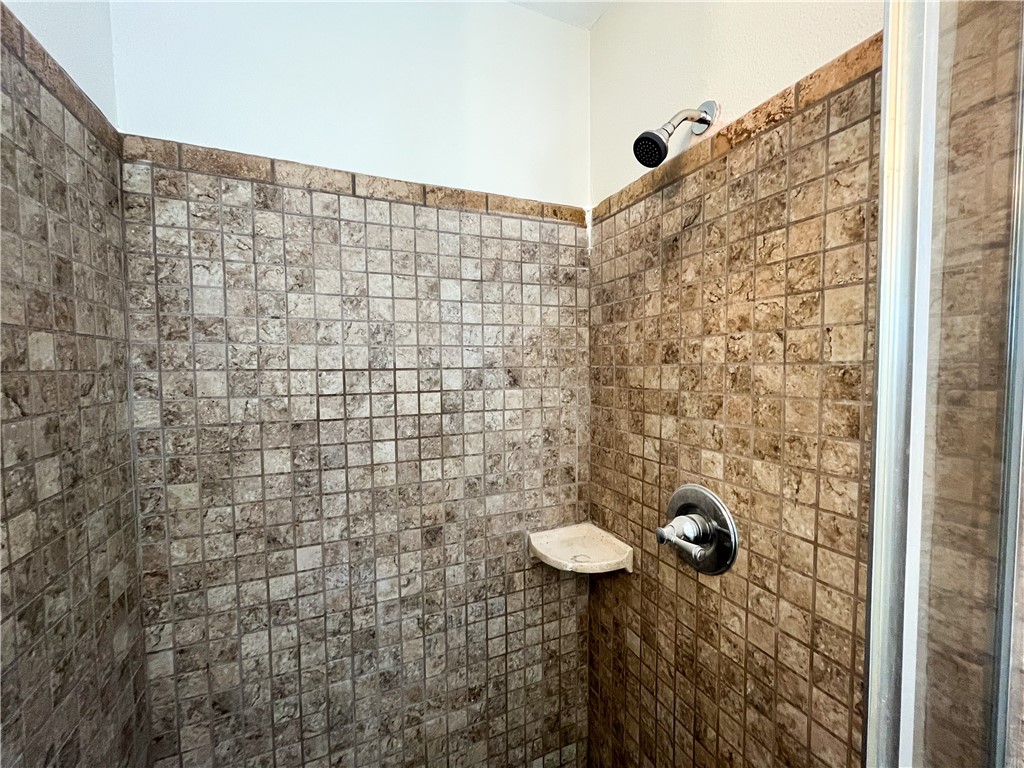 13004 Chestnut Avenue Rancho Cucamonga, CA 91739 - Photo 16 of 28 a bathroom with a shower