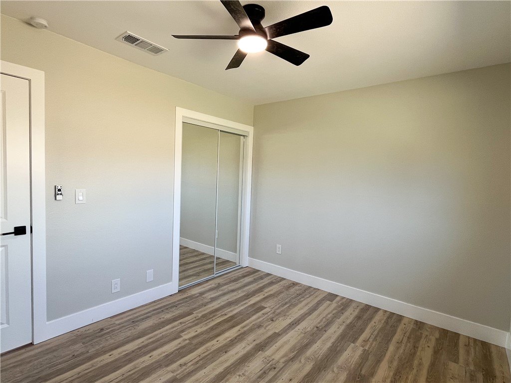 13004 Chestnut Avenue Rancho Cucamonga, CA 91739 - Photo 18 of 28 wooden floor in an empty room