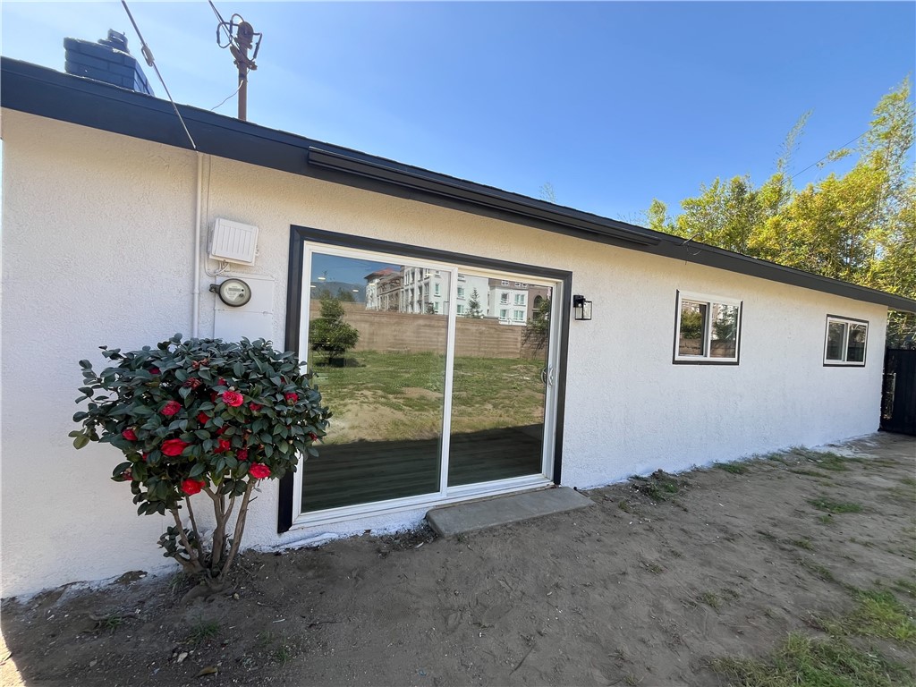 13004 Chestnut Avenue Rancho Cucamonga, CA 91739 - Photo 24 of 28 a house view with a outdoor space