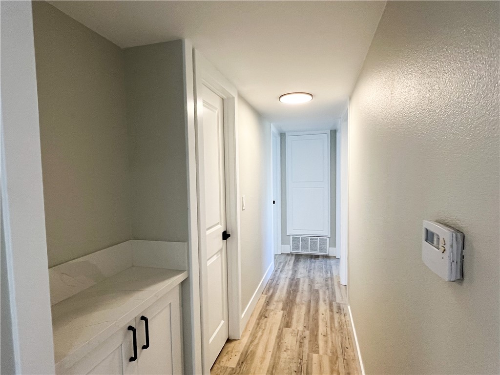 13004 Chestnut Avenue Rancho Cucamonga, CA 91739 - Photo 9 of 28 a bathroom with a sink and a mirror