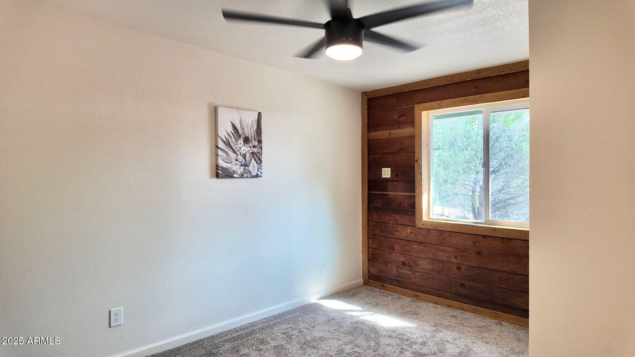 647 South Moonlight Drive Payson, AZ 85541 - Photo 16 of 50 an empty room with windows