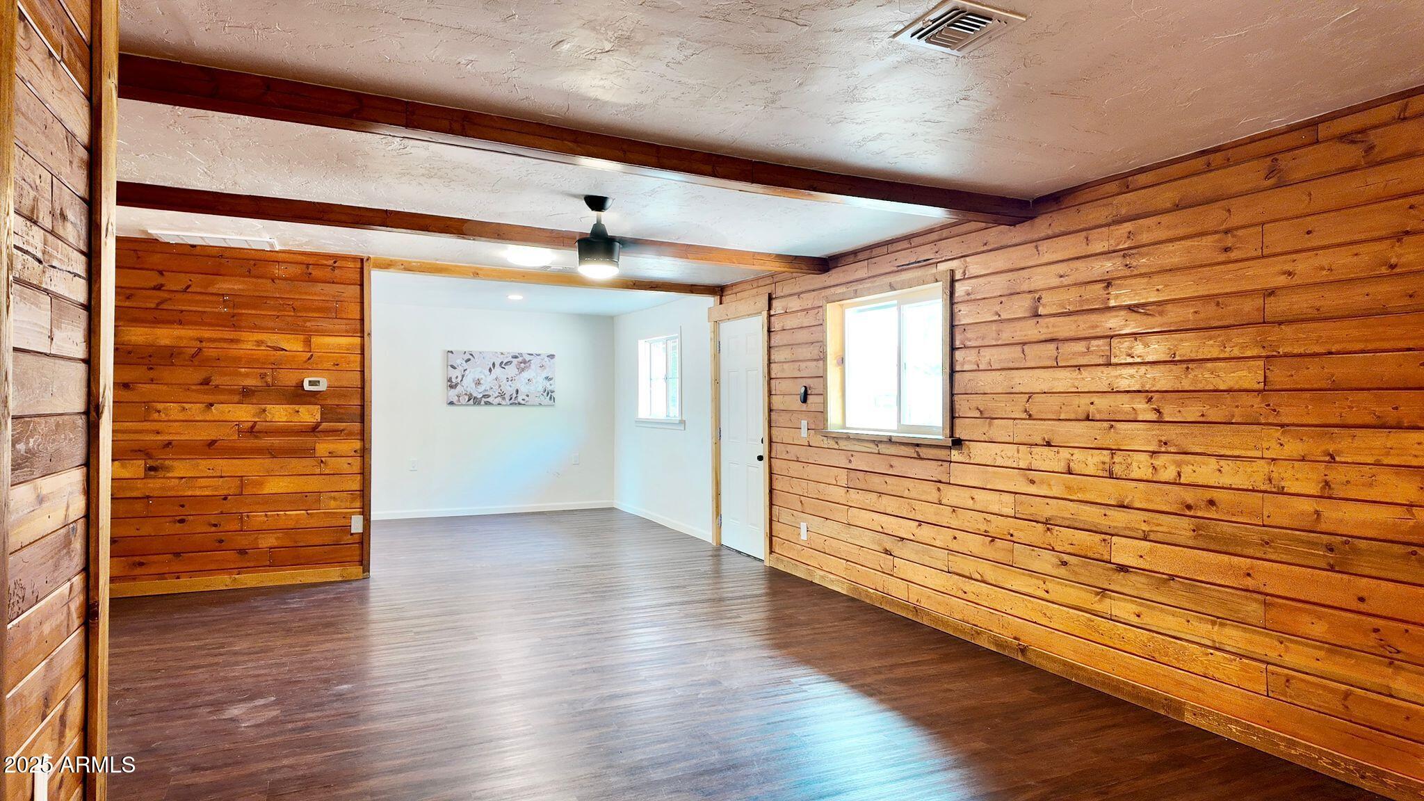 647 South Moonlight Drive Payson, AZ 85541 - Photo 17 of 50 a view of a hallway with wooden floor and stairs