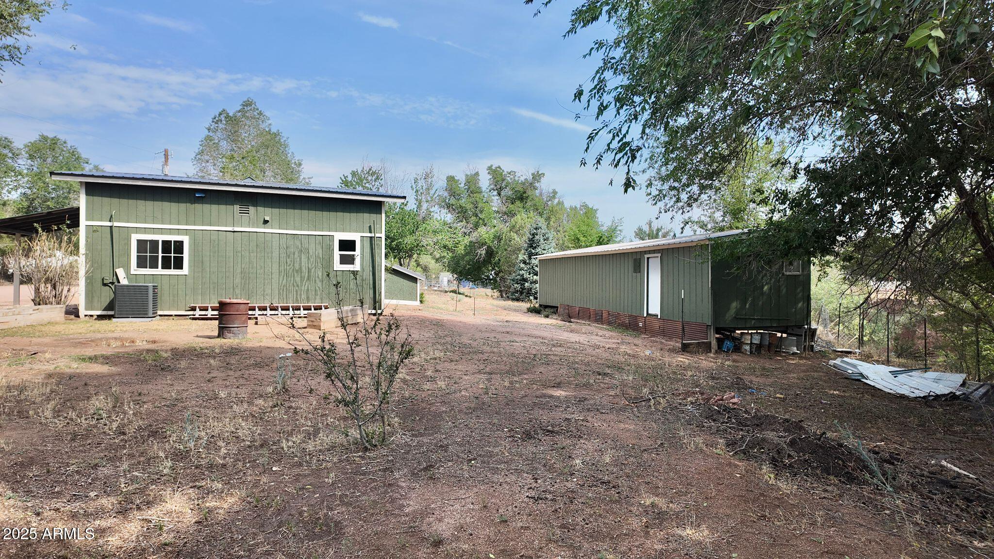 647 South Moonlight Drive Payson, AZ 85541 - Photo 21 of 50 a view of a house with a yard and garage