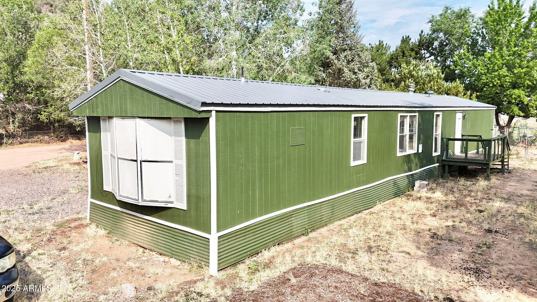 647 South Moonlight Drive Payson, AZ 85541 - Photo 49 of 50 a view of a house with a backyard