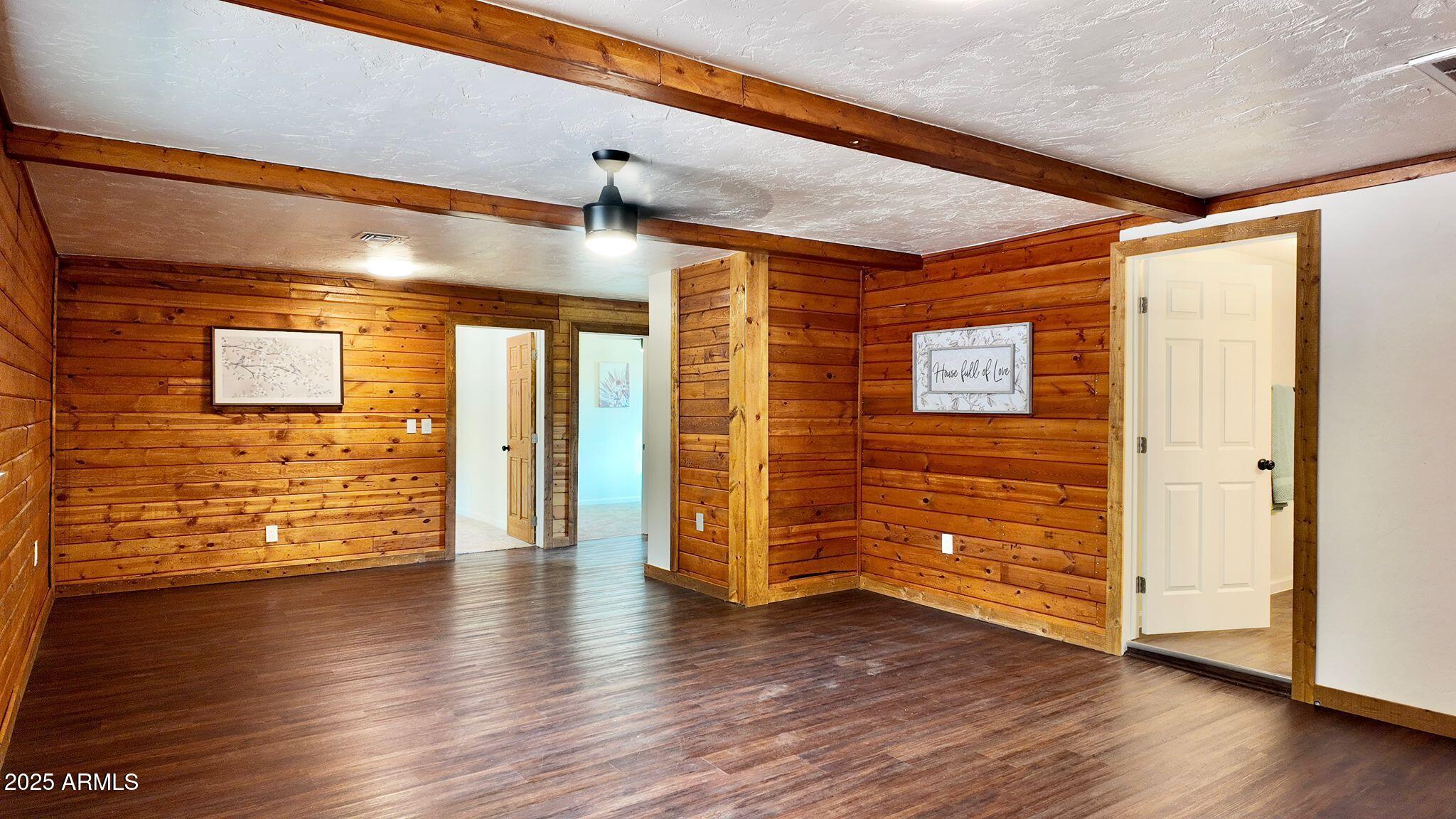 647 South Moonlight Drive Payson, AZ 85541 - Photo 5 of 50 an empty room with wooden floor and windows