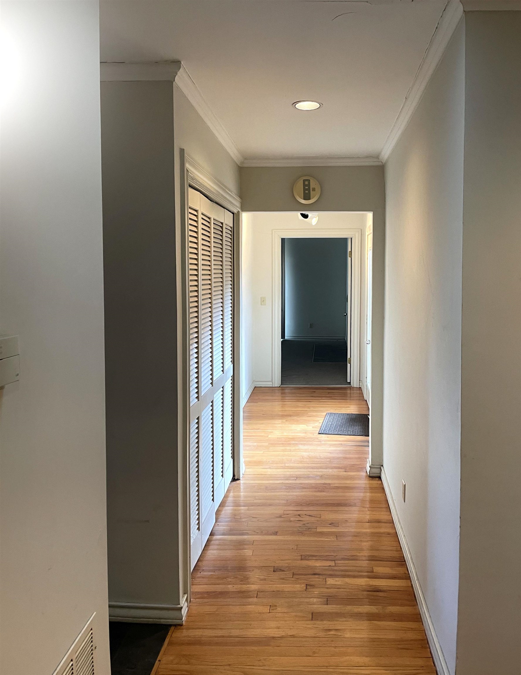 1801 West Commerce Street San Saba, TX 76877 - Photo 11 of 29 a view of a hallway with wooden floor