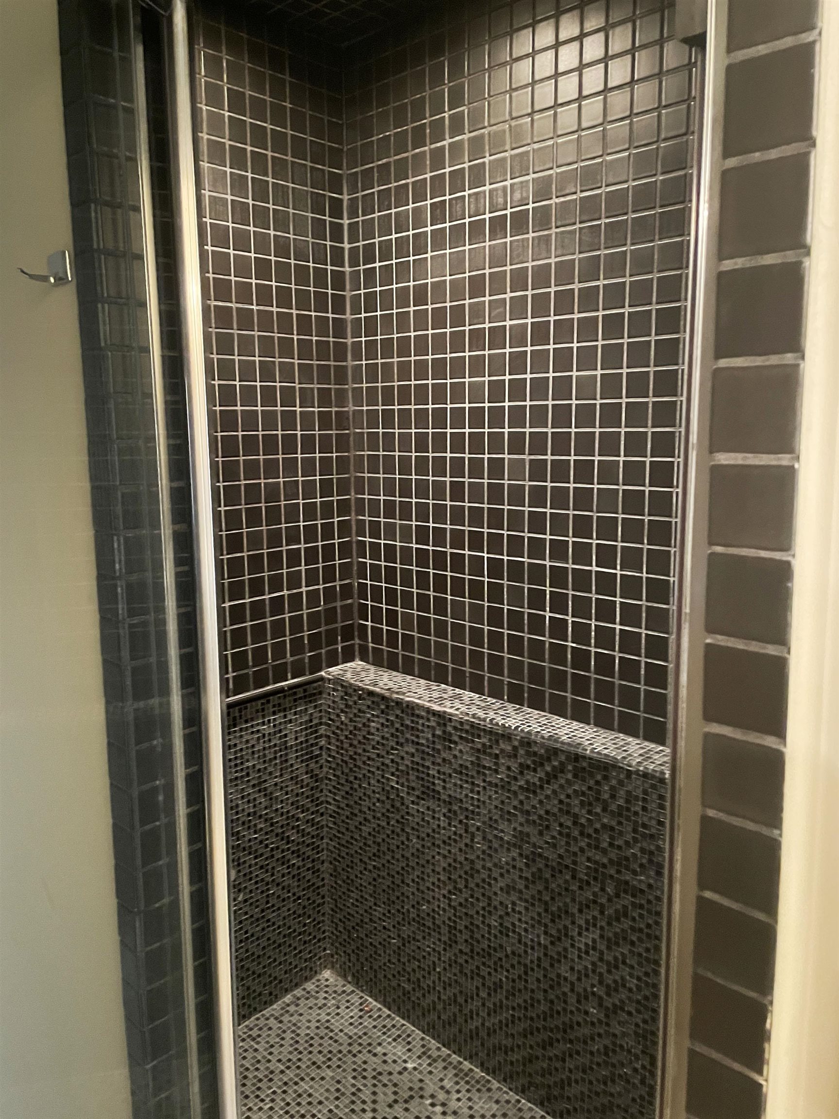 1801 West Commerce Street San Saba, TX 76877 - Photo 16 of 29 a bathroom with a shower