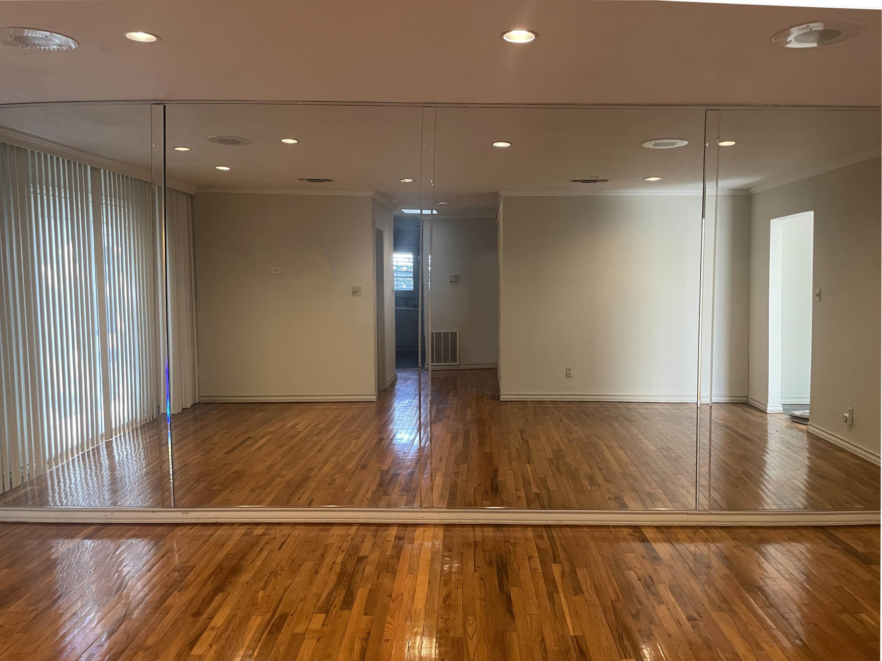 1801 West Commerce Street San Saba, TX 76877 - Photo 23 of 29 a view of an empty room with wooden floor