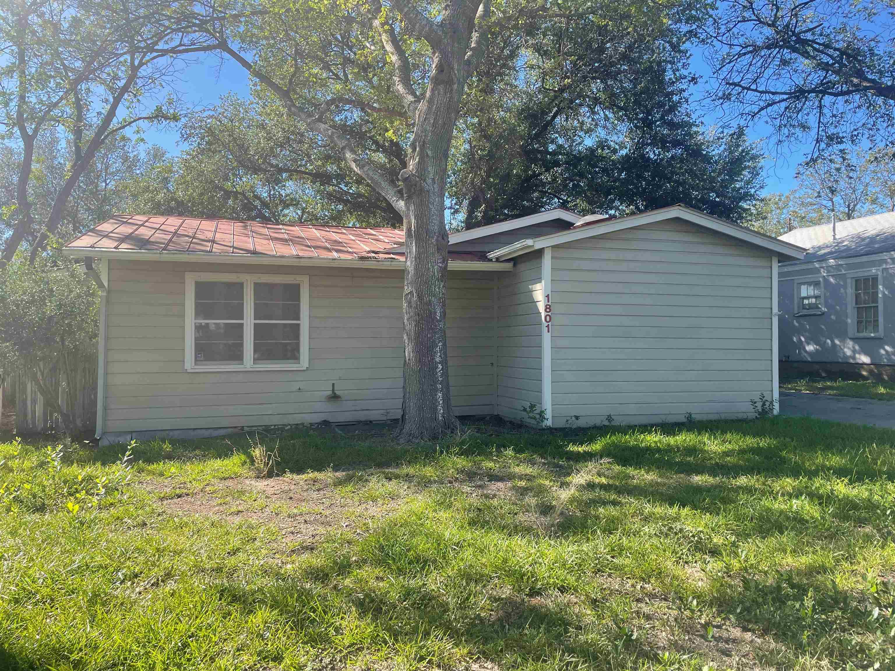 1801 West Commerce Street San Saba, TX 76877 - Photo 3 of 29 a view of a backyard