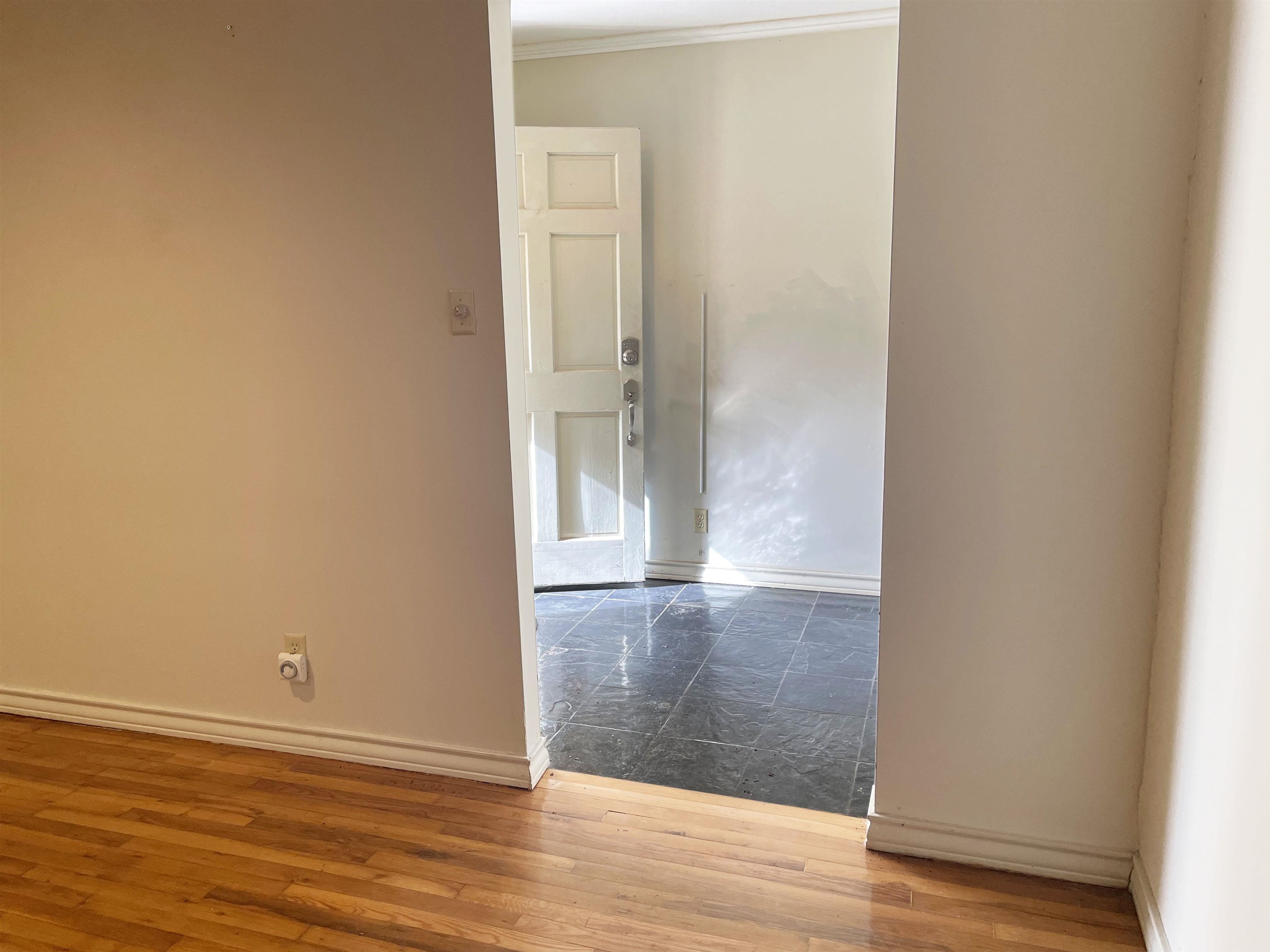 1801 West Commerce Street San Saba, TX 76877 - Photo 5 of 29 an empty room with wooden floor