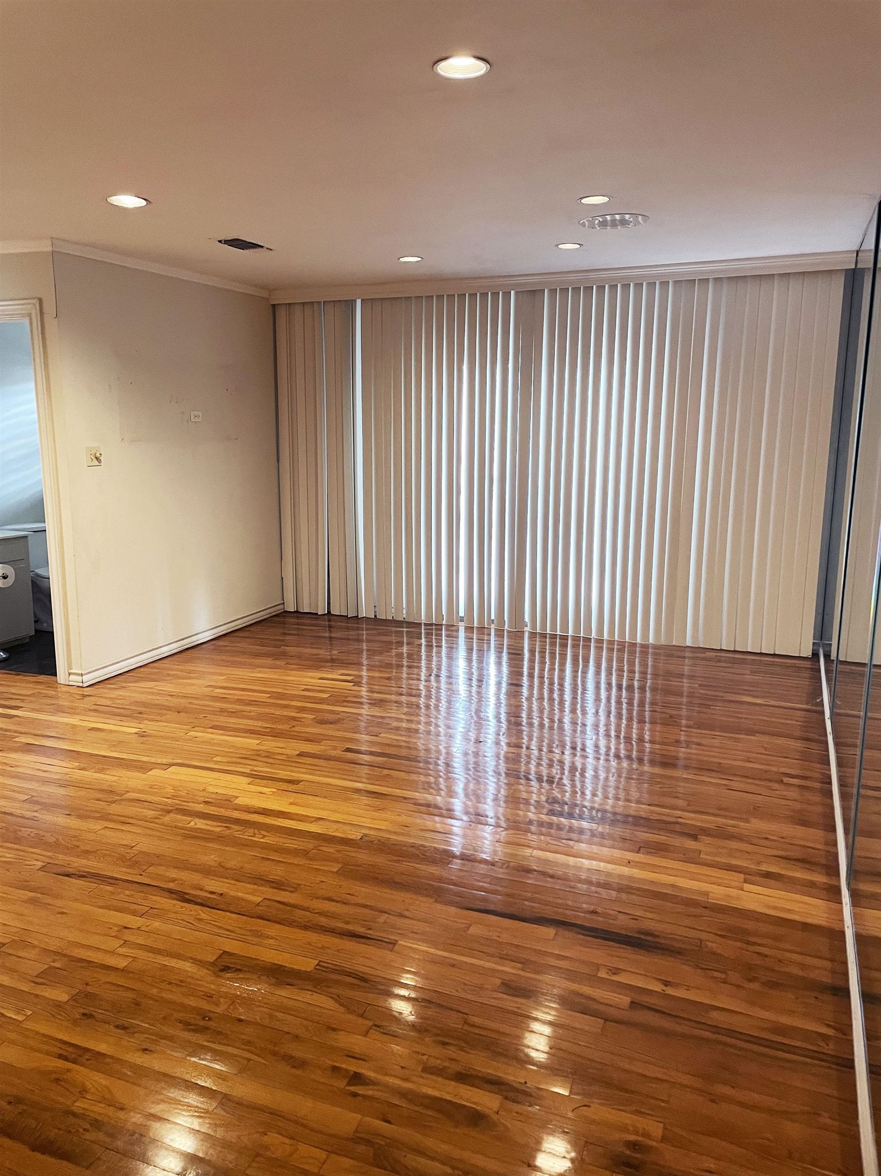 1801 West Commerce Street San Saba, TX 76877 - Photo 7 of 29 a view of a room with wooden floor and entryway
