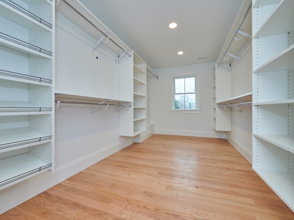 26 Old Colony Road Arlington, MA 02474 - Photo 19 of 32 a view of empty room with wooden floor and window