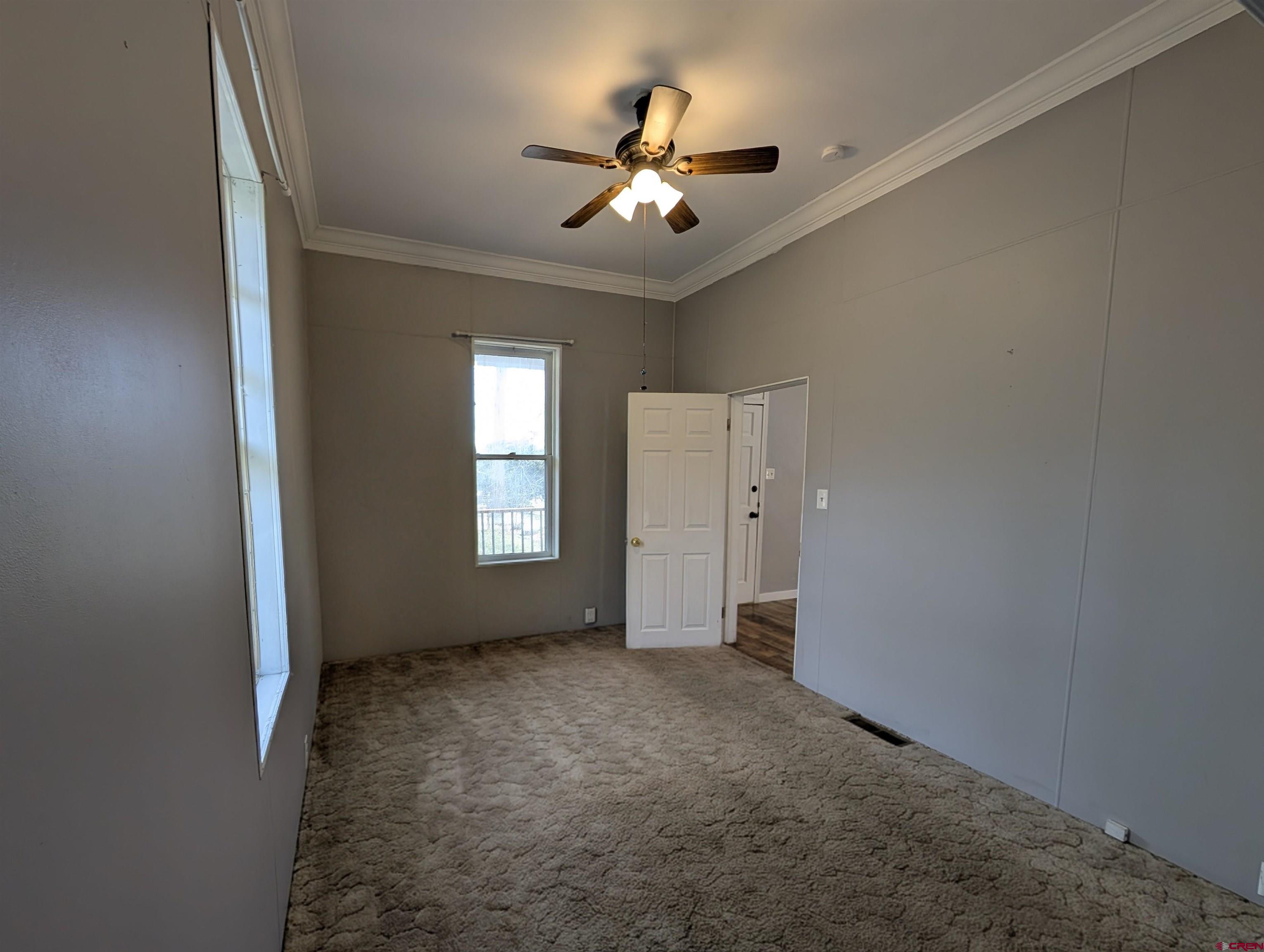 16184 Chipeta Road Montrose, CO 81403 - Photo 12 of 24 a view of an empty room with a window