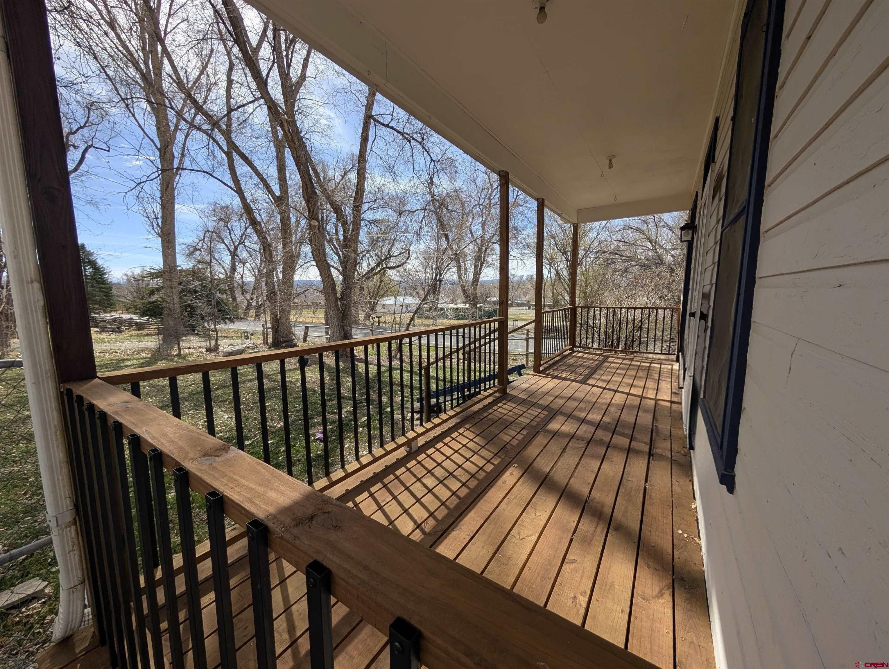 16184 Chipeta Road Montrose, CO 81403 - Photo 17 of 24 a view of balcony with wooden floor