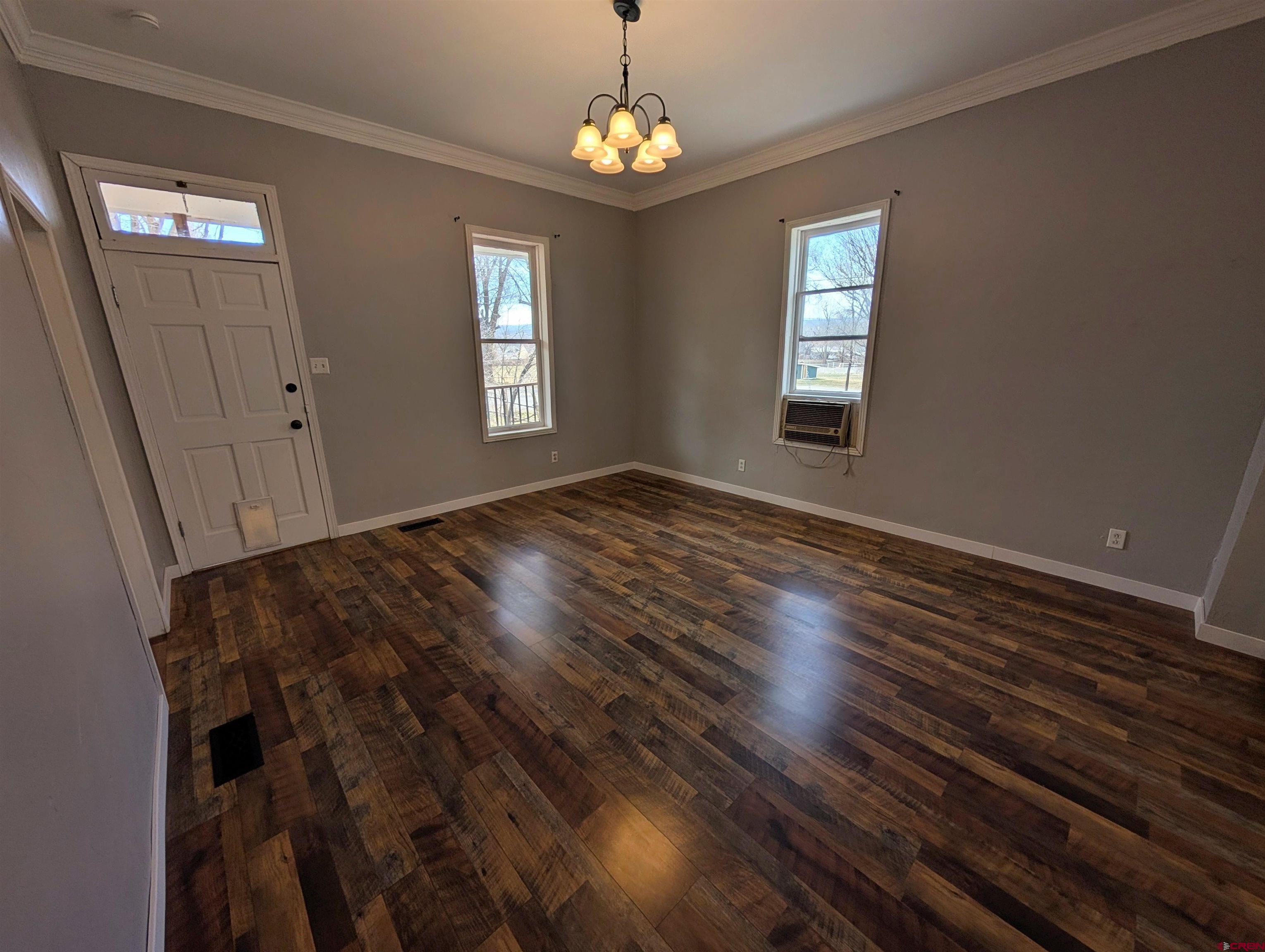 16184 Chipeta Road Montrose, CO 81403 - Photo 2 of 24 a view of livingroom with window