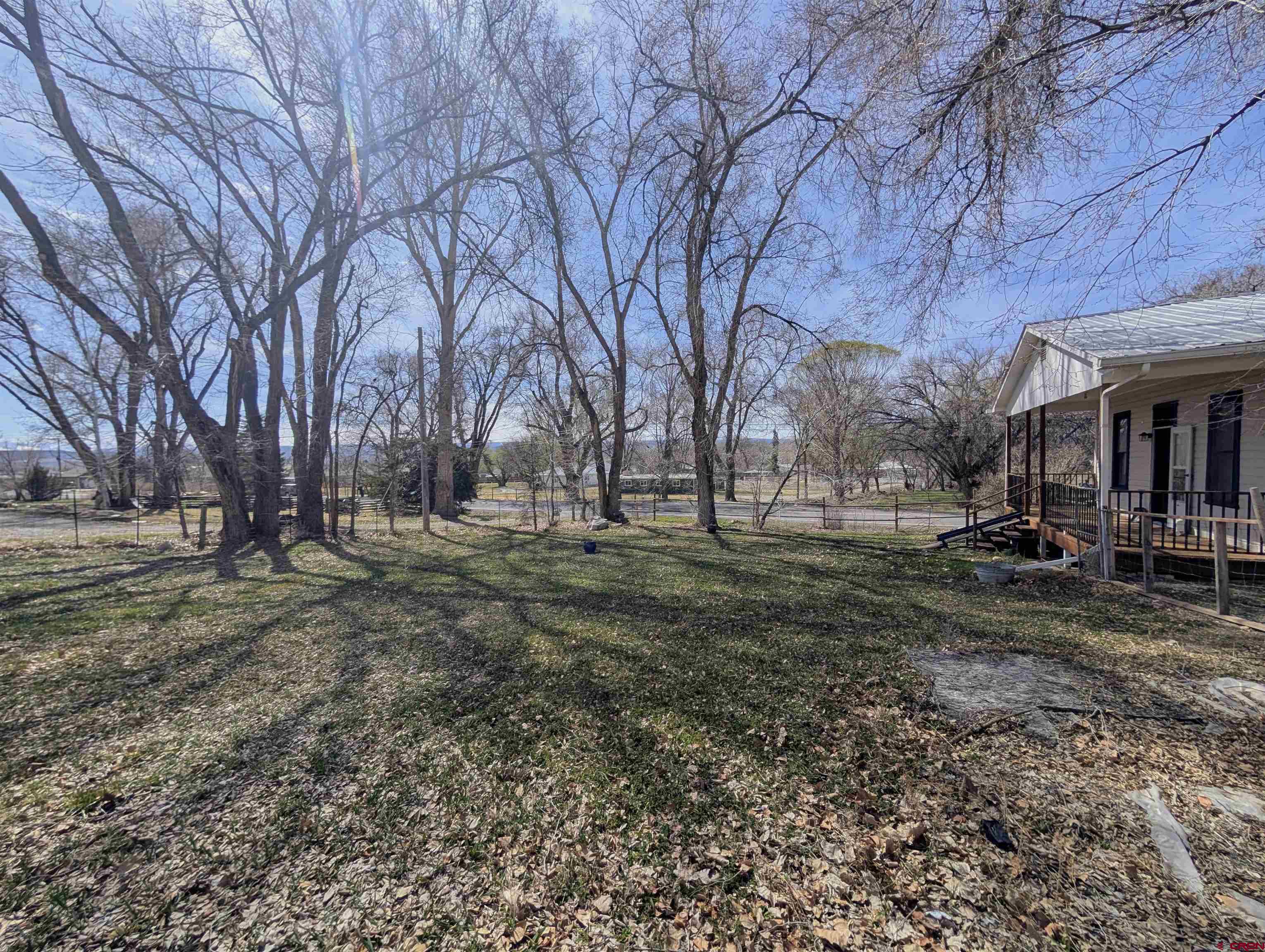 16184 Chipeta Road Montrose, CO 81403 - Photo 21 of 24 a view of yard with trees