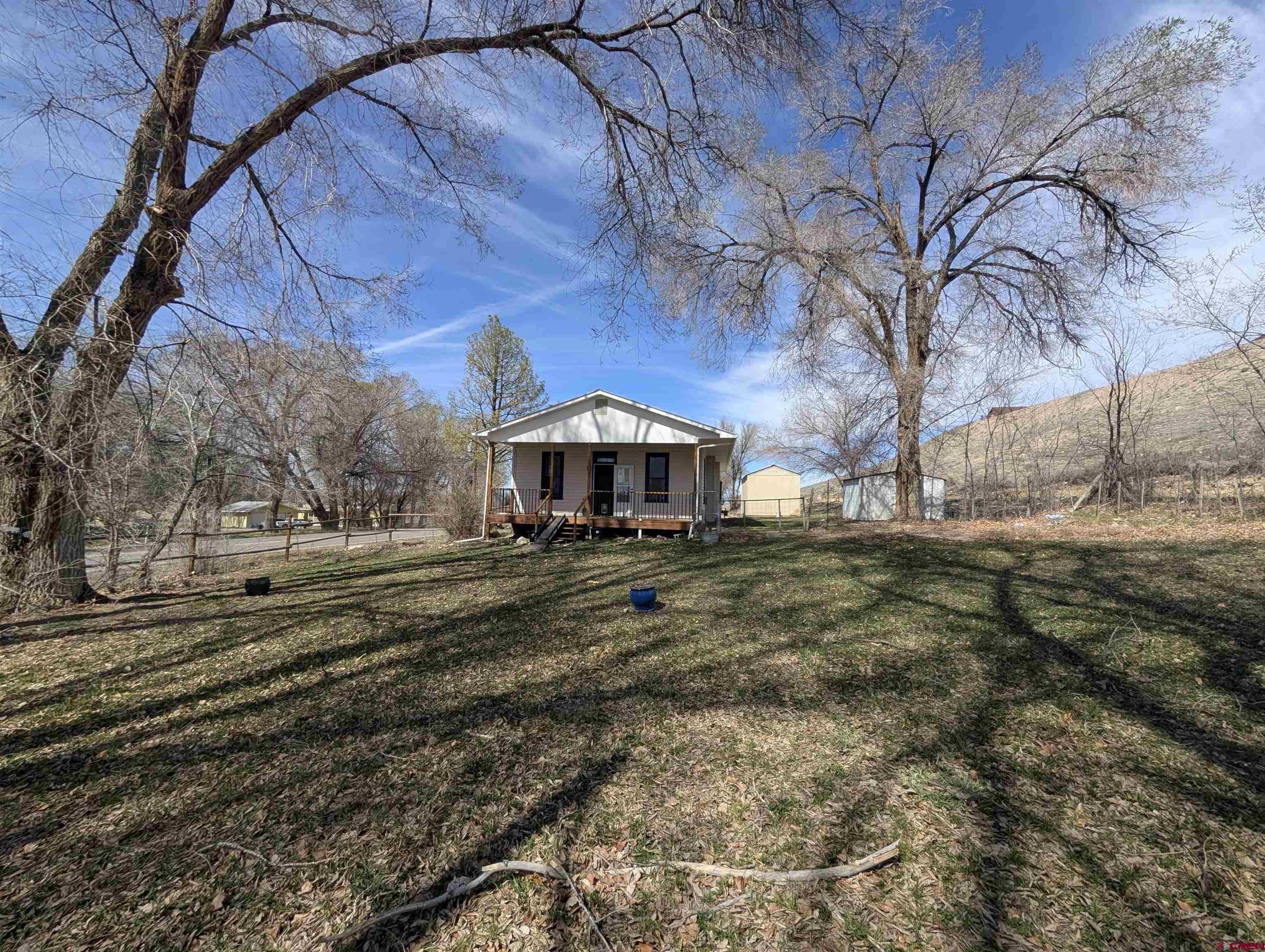 16184 Chipeta Road Montrose, CO 81403 - Photo 24 of 24 a view of a house with a yard
