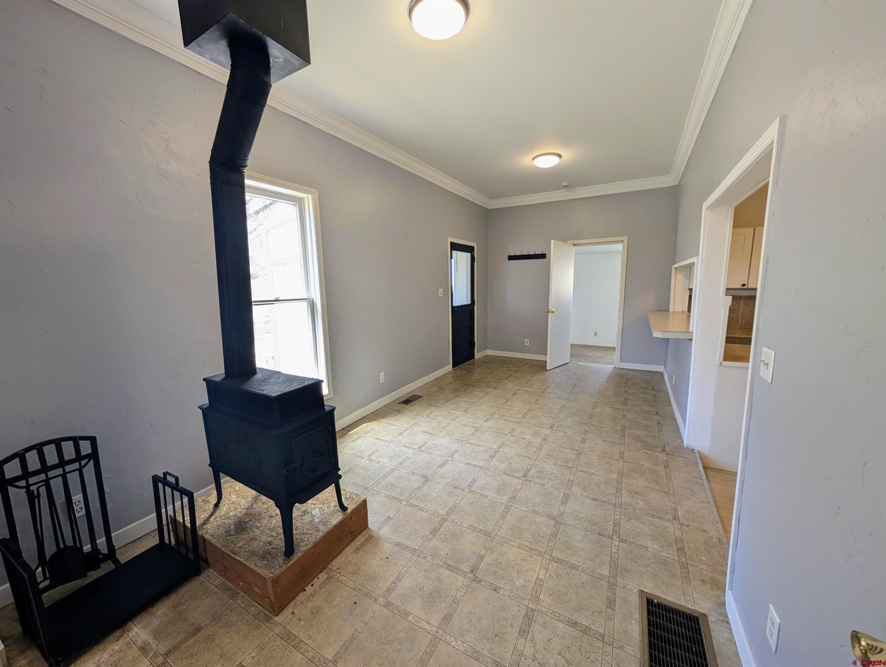 16184 Chipeta Road Montrose, CO 81403 - Photo 4 of 24 a view of livingroom with furniture and a window