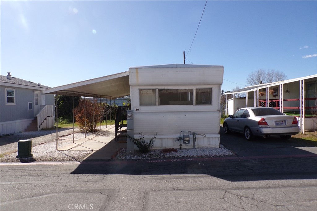 12710 3rd Street, Unit 36 Yucaipa, CA 92399 - Photo 2 of 10 a front view of a house
