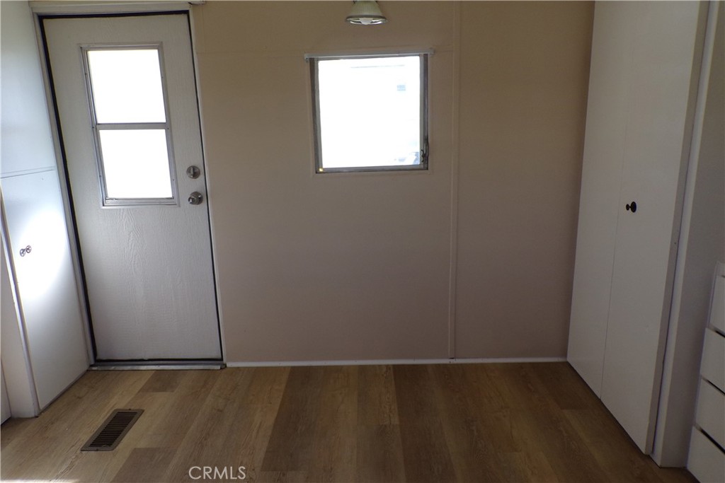 12710 3rd Street, Unit 36 Yucaipa, CA 92399 - Photo 4 of 10 an empty room with windows