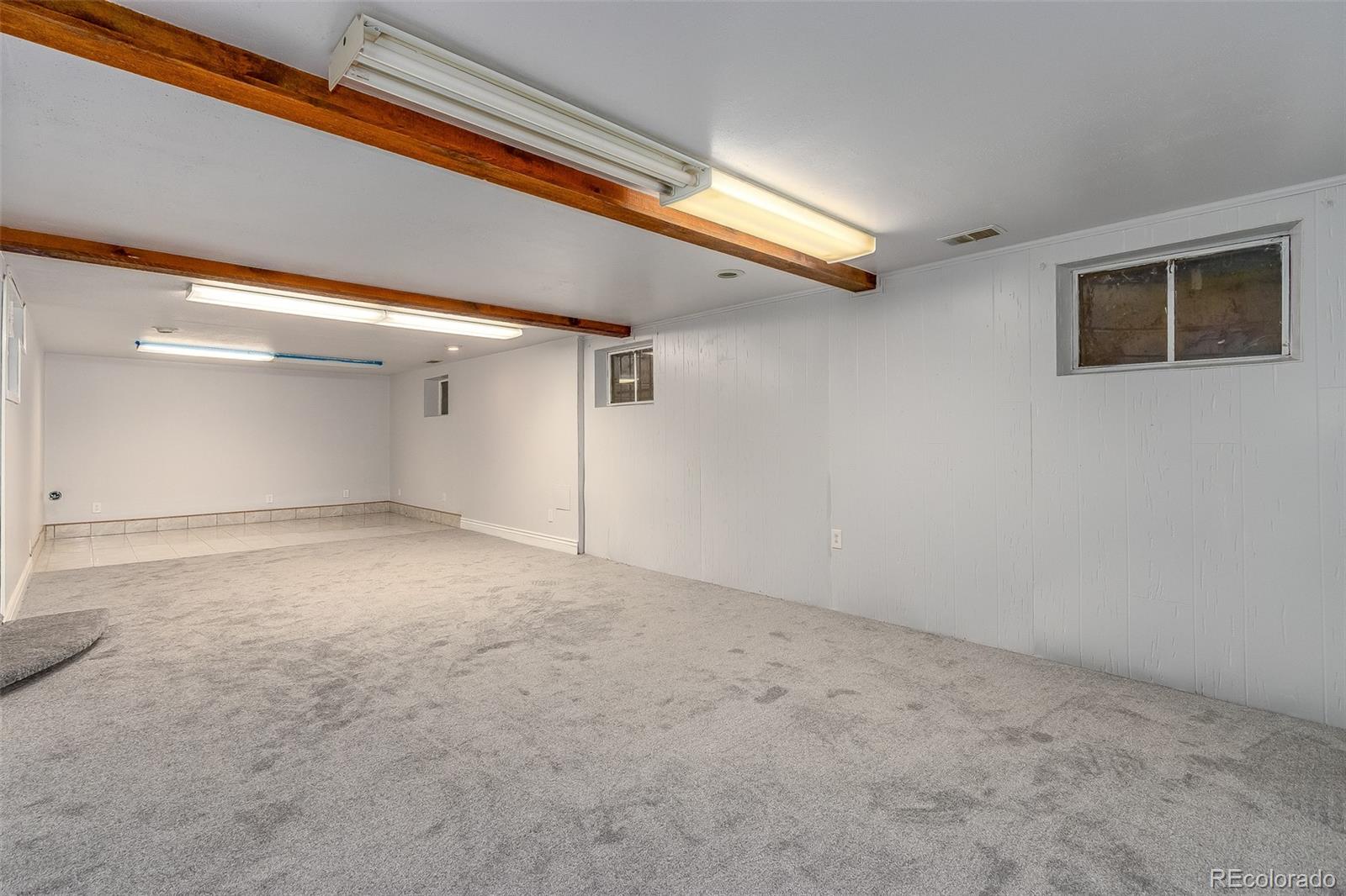 3217 South Stuart Street Denver, CO 80236 - Photo 24 of 30 a view of an empty room