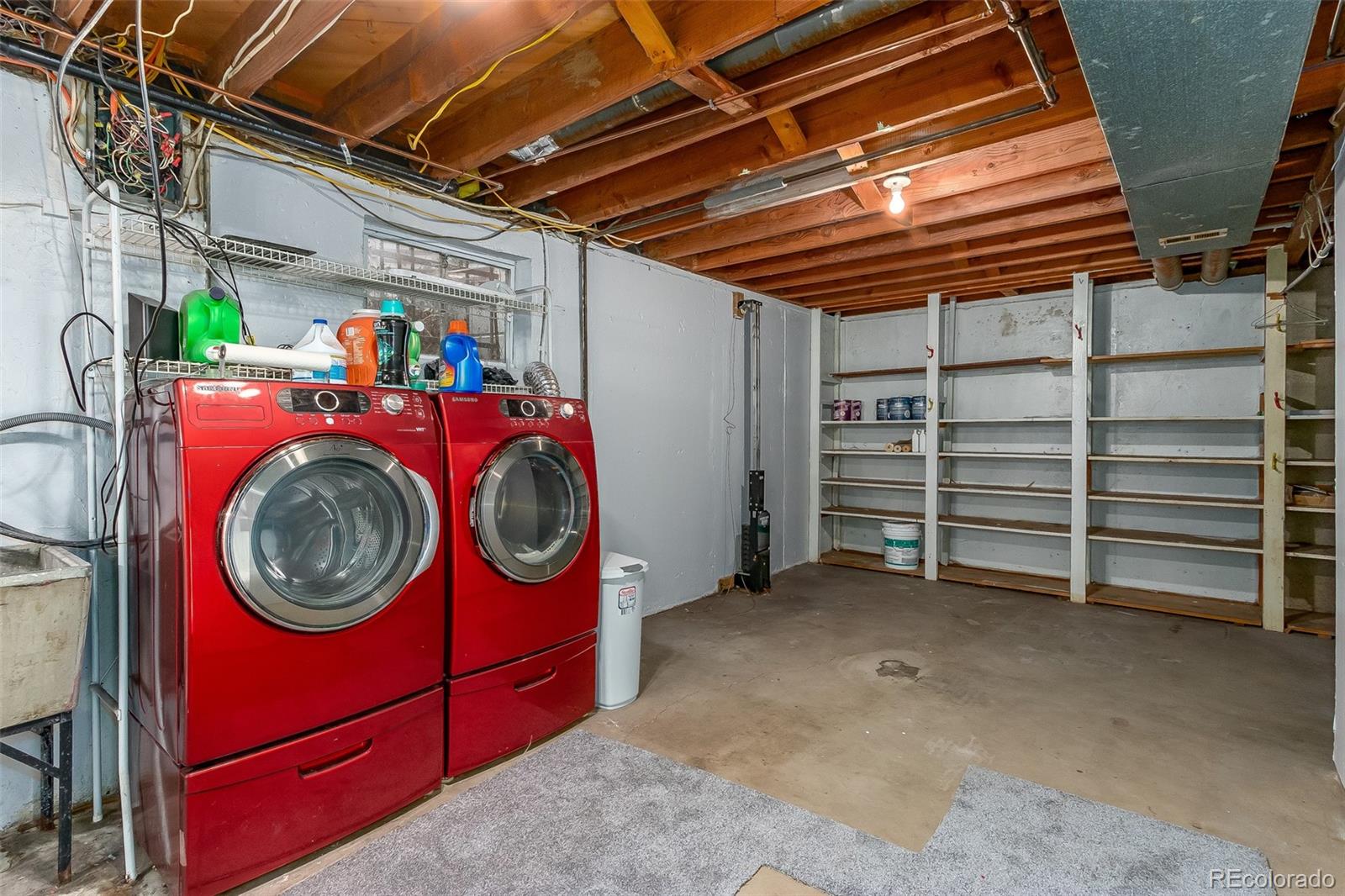 3217 South Stuart Street Denver, CO 80236 - Photo 28 of 30 a utility room with dryer and washer