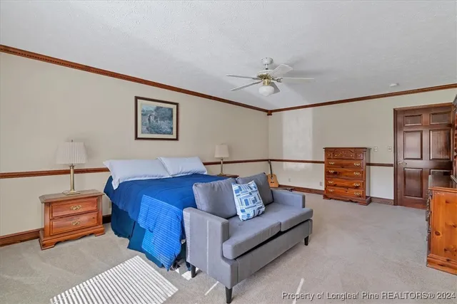 a bathroom with a sink vanity mirror and toilet