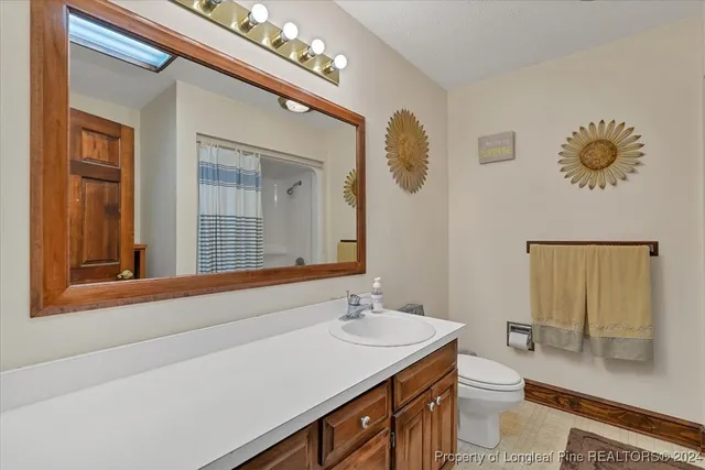 a view of a hallway with a white walls