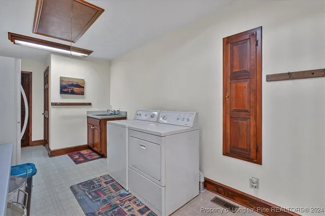 a bathroom with a sink toilet and mirror