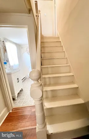 a bathroom with a tub and shower