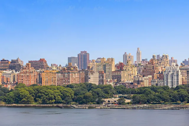 a view of a city with tall buildings in the background
