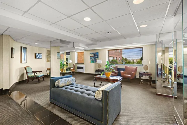 a living room with furniture and a table