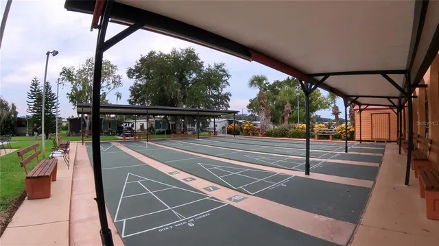 a view of a swimming pool with a porch