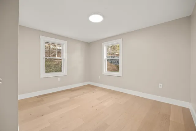 an empty room with windows